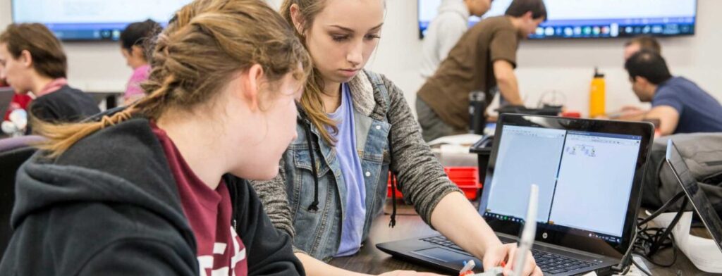 Students testing equipment.